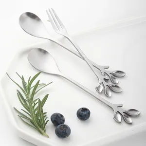 Stainless steel leaf handle spoon and fork set, elegant cutlery for dessert coffee.