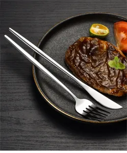 Stainless steel cutlery set with modern sleek design, ideal for steak, hotel and home dining.