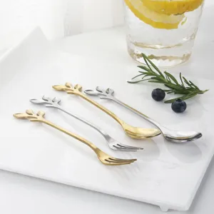 Stainless steel leaf spoon and fork set, elegant gold and silver dessert cutlery for coffee and fruit.