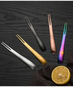 Stainless steel dual-use fruit fork and tea spoon detail view showing multiple colors.