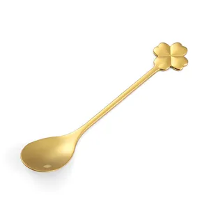 Gold stainless steel coffee spoon with elegant four leaf clover handle for dessert and stirring