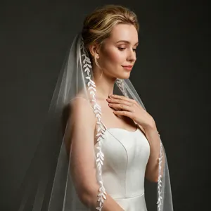 Elegant bridal veil with delicate leaf embroidery, forest style wedding accessory.