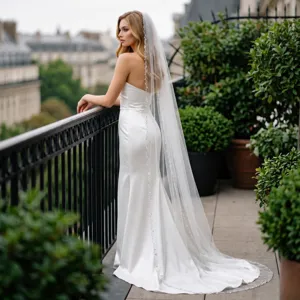 Elegant single-layer bridal wedding veil with hand-sewn beaded lace edge for church ceremony.