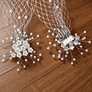 Bridal birdcage veil with pearl rhinestone hair comb wedding hair accessory elegant short style.
