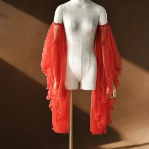 Detailed view of red sheer mesh ruffled bridal sleeves, elegant wedding arm cover accessories.