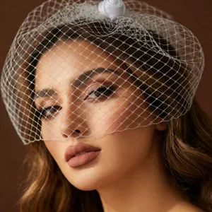 French vintage bridal face veil mesh headpiece, elegant white floral hair accessory detail.