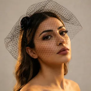 French vintage bridal mesh veil fascinator with black flower hair accessory for wedding.