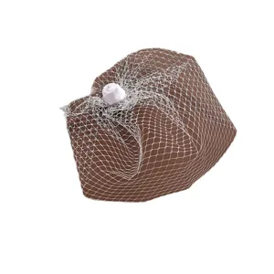 French vintage bridal fascinator with white mesh veil and elegant rose flower accessory.