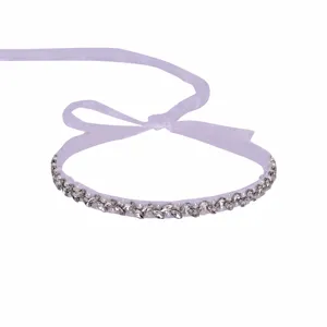 Bridal rhinestone belt wedding dress sash with sparkling crystals and elegant white ribbon.