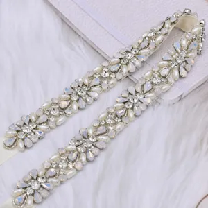 Detailed view of the handmade rhinestone pearl bridal sash belt for wedding dresses.
