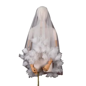 Short double layer wedding bridal veil featuring sweet 3D floral appliqués for dreamy look.