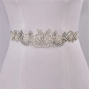 Detailed view of the handcrafted rhinestone crystal bridal belt, exquisite floral wedding dress accessory.