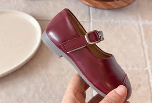 Classic burgundy girls Mary Jane shoes, soft sole, elegant French style kids dress shoes.