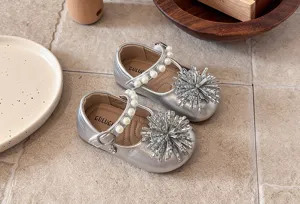 Silver toddler girls Mary Jane shoes with pearl straps and sparkling crystal starburst.