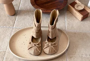 Kids stylish mid-calf cutout boots with sweet bow detail, cozy retro spring footwear.