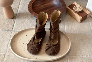 Brown suede split-toe girls mid-calf boots with bow detail, stylish toddler footwear close-up view
