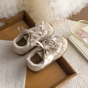 Baskets rétro nœud papillon enfant chaussures souples décontractées vue détail beige