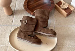 Brown suede cutout girls mid-calf boots with bow and buckle, stylish vintage children footwear detail