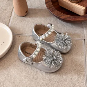 Girls silver leather princess shoes with pearl straps and sparkly rhinestone flower details.