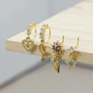 Vergoldeter Piercing Schmuck Set mit Zirkonia, süße Nasenringe und Stecker mit Anhängern.