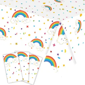 Disposable rainbow cloud tablecloth and party napkins set for birthday decorations.