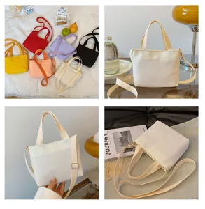 Petit sac cabas en toile pour femme, sac à bandoulière unicolore décontracté avec large sangle.