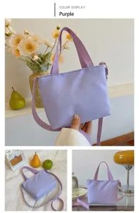 Vue détaillée du sac cabas en nylon violet, mettant en valeur tissu et bandoulière.