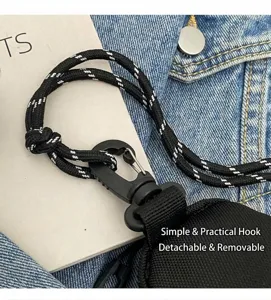 Mini Lippenstift Kopfhörertasche mit schwarzem geflochtenem Riemen, stilvolles Streetwear-Accessoire.