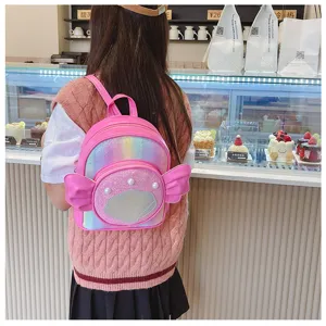 Cute pink glitter kids backpack for girls, shell and wing design, perfect for school and travel.