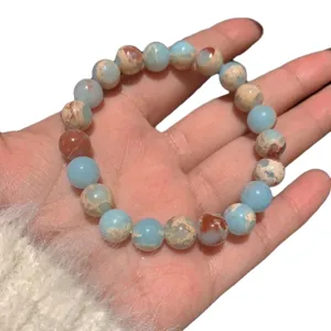 Bracelet de perles en pierre naturelle, design bloc de couleur bleu et rouge, bijou tendance.