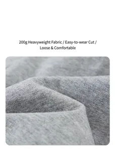 Grey cotton fabric detail close-up showing soft texture and premium quality for children shorts.