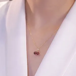 Elegant red cherry garnet pendant necklace for women, dainty titanium steel clavicle chain.