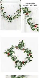Detail shot of artificial Christmas holly garland with red berries, ideal for festive wall decor.