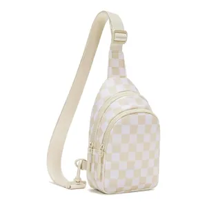 Detail view of the beige checkered crossbody sling bag, featuring zipper and adjustable strap.