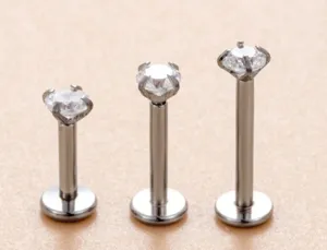 Detail shot of internal thread stainless steel labret studs with clear zirconia.