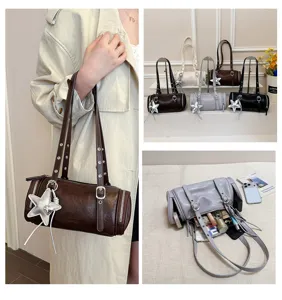 Modische zylindrische Umhängetasche für Damen, trendige Bowlingtasche mit Sternanhänger.