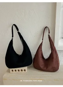 Detail van vintage suède-look schoudertas, casual hobo tas ontwerp met grote capaciteit.