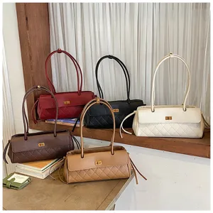 Elegant quilted leather shoulder bag with chic turn-lock closure for women daily use.