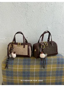 Bolso de mano Boston de ante retro para mujer, bolso de hombro vintage elegante.