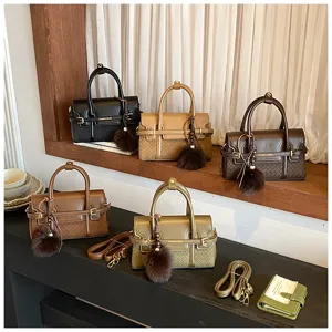 Stylish women handbag shoulder crossbody bag set with plush pom-pom charm and top handle.
