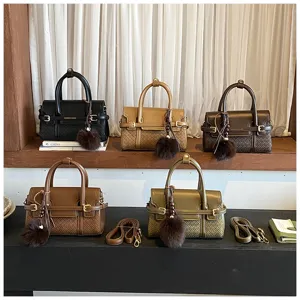 Chic women woven shoulder handbag, versatile crossbody bag with plush charm for daily commute.