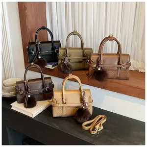 Chic minimalist women's handbag, versatile top-handle shoulder crossbody bag for daily commute.