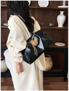Black slouchy shoulder tote bag, large capacity casual commuting handbag for women daily.