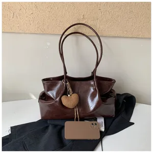 Casual vintage brown PU leather tote bag for women, large capacity shoulder handbag for daily work.