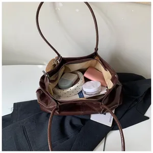 Vintage brown PU leather shoulder bag, casual large capacity tote handbag for women daily work.
