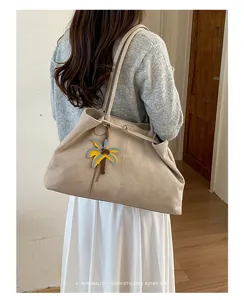 Large capacity soft tote bag for women, retro casual shoulder bag with cute palm charm.