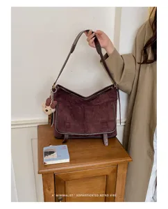 Korean fashion brown suede shoulder bag retro casual crossbody bag with cute bear pendant.