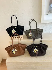 Large capacity retro suede tote bag for women, stylish casual shoulder bag with cute charm.