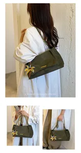 Chic suede shoulder bag for women with chain strap and cute palm charm, stylish crossbody.