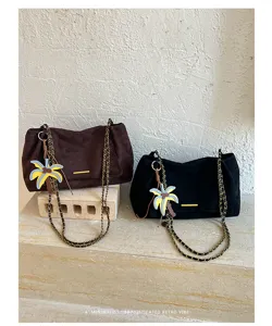 Stylish women suede shoulder bag retro chain crossbody bag with cute palm tree charm elegant.